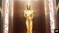 FILE - An Oscar statue is displayed at the Oscars at the Dolby Theatre in Los Angeles.