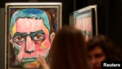 A painting by David Bowie is featured in an exhibit of his artwork in Berlin, Germany. May 2014 (REUTERS/Tobias Schwarz)