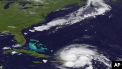 An image released by the NOAA made from the GEOS East satellite shows Hurricane Irene on as it passes over Puerto Rico and the Dominican Republic, August 23, 2011
