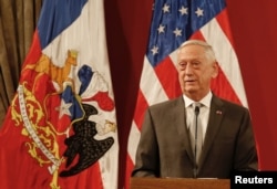 U.S. Defense Minister James Mattis speaks next to Chilean Defense Minister Alberto Espina (not pictured) after signing exchange agreements, during a meeting at La Moneda Presidential Palace in Santiago, Chile, Aug. 16, 2018.