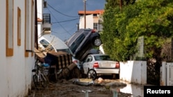 Cars are piled up following storm Bora in the area of Lalysos, on the island of Rhodes, Greece, Dec. 1, 2024. 