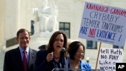 From left, Sen. Richard Blumenthal, D-Conn., Sen. Kamala Harris, D-Calif., Sen. Mazie Hirono, D-Hawaii, speak as protesters rally against Supreme Court nominee Brett Kavanaugh as the Senate Judiciary Committee debates his confirmation, Sept. 28, 2018.