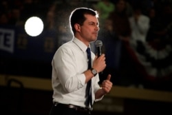 Democratic presidential candidate former South Bend, Ind., Mayor Pete Buttigieg, speaks at a Get Out the Caucus event at Lincoln High School in Des Moines, Iowa, Sunday, Feb. 2, 2020.