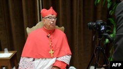 FILE - Newly-appointed Cardinal, Mexico's Sergio Obeso Rivera, speaks with journalists in the Apostolic Palace at St Peter's Basilica in The Vatican, June 28, 2018. 