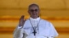 Newly elected Pope Francis, Cardinal Jorge Mario Bergoglio of Argentina appears on the balcony of St. Peter's Basilica after being elected by the conclave of cardinals, at the Vatican, March 13, 2013.