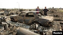 Le feu de forêt a laissé des scènes apocalyptiques à Fort McMurray