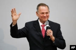 Former Alabama Chief Justice and U.S. Senate candidate Roy Moore speaks at a revival, Nov. 14, 2017, in Jackson, Alabama.