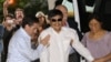 China Urges Exiled Dissident to Follow Chinese Law