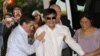 Blind Chinese legal activist Chen Guangcheng arrives at Washington Square Village on the campus of New York University, May 19, 2012, in New York.