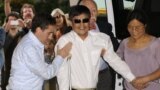 Blind Chinese legal activist Chen Guangcheng arrives at Washington Square Village on the campus of New York University, May 19, 2012, in New York.