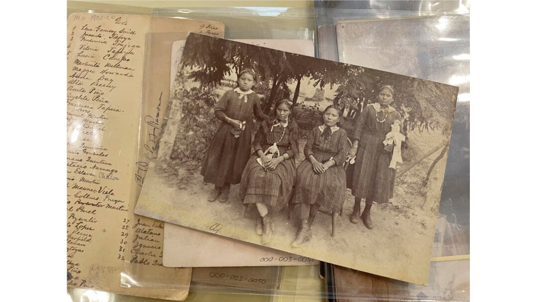 FILE - This July 8, 2021, image of material archived at the Center for Southwest Research at the University of New Mexico in Albuquerque, New Mexico, shows a group of unidentified Indigenous students in the late 19th century.
