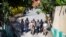 Security forces investigate the perimeters of the residence of Haitian President Jovenel Moise, in Port-au-Prince, Haiti, July 7, 2021. Gunmen assassinated Moise and wounded his wife in their home early Wednesday. 