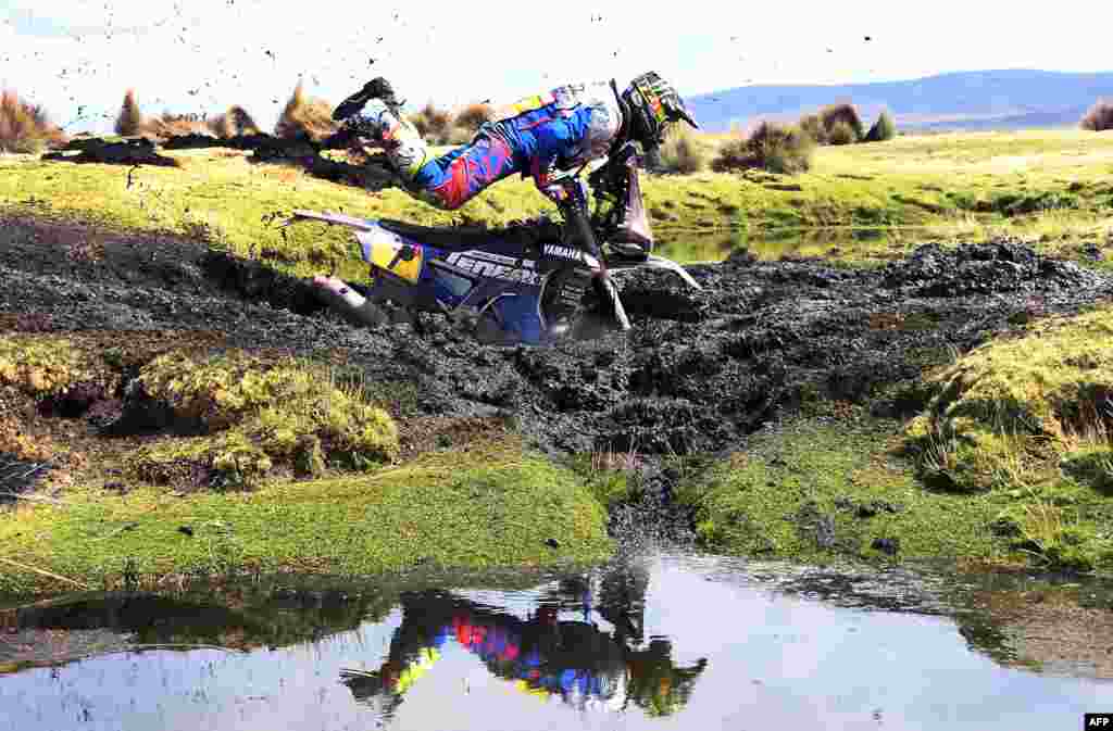 Argentinian biker Franco Caimi crashes during Stage 7 of the 2018 Dakar Rally between La Paz and Uyuni, Bolivia, Jan. 13, 2018.