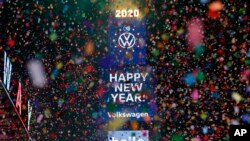 Confetti falls during a New Year's celebration in New York's Times Square, Jan. 1, 2020. 