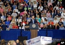 FILE - President Donald Trump speaks during a rally at the Covelli Centre in Youngstown, Ohio, July 25, 2017.