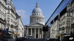 FILE - In this file photo dated Tuesday, March 31, 2020, a bus drives to the Pantheon in Paris. The remains of American-born singer and dancer Josephine Baker will be reinterred at the Pantheon monument in Paris.