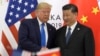 ARCHIVO - El presidente electo de Estados Unidos, Donald Trump, a la izquierda, estrecha la mano del líder chino, Xi Jinping, durante una reunión al margen de la cumbre del G-20 en Osaka, oeste de Japón, el 29 de junio de 2019. AP