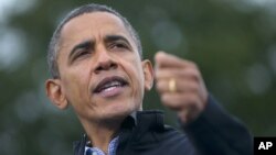 President Barack Obama speaks during a campaign event at Sloan's Lake Park in Denver, Colorado, Oct. 4, 2012. 