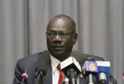 FILE - South Sudan's information minister Michael Makuei attends a press conference in Addis Ababa, Ethiopia, Jan. 5, 2014.