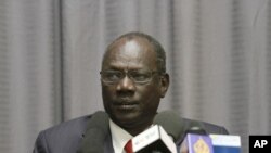 FILE - In this Jan. 5, 2014, photo, South Sudan's information minister, Michael Makuei, attends a press conference in Addis Ababa, Ethiopia.