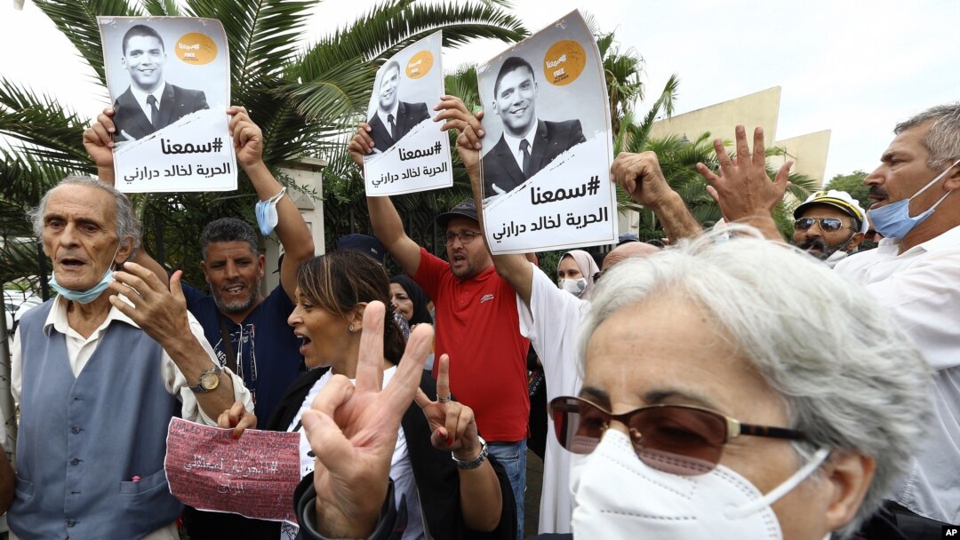 People gather in a show of support to Khaled Drareni,outside the court house Tuesday, Sept.8, 2020 in Algiers. Drareni was imprisoned Aug. 10 for "inciting an unarmed gathering" and "endangering national unity" linked to coverage of Algeria's Hirak…