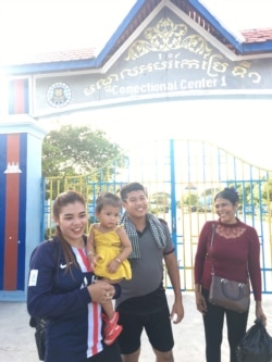 In this supplied photo, Kong Raiya stands with family members after his release, Friday, November 29, 2019. (Courtesy Photo)