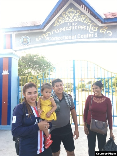 In this supplied photo, Kong Raiya stands with family members after his release, Friday, November 29, 2019. (Courtesy Photo)