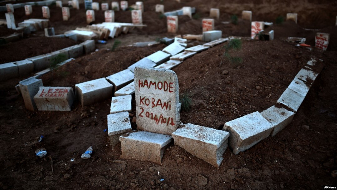 Graves of Kurdds killed fighting alongside People's Protection Units (YPG) against Islamic State (IS) jihadists for control of Kobani, Syria, Suruc, Turkey, Oct.15, 2014.