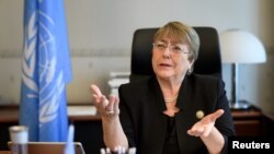 Former Chilean president Michelle Bachelet speaks from her office at the Palais Wilson on her first day as new United Nations (UN) High Commissioner for Human Rights in Geneva, Switzerland, September 3, 2018. Fabrice Coffrini/Pool via REUTERS - RC1F5BFFE