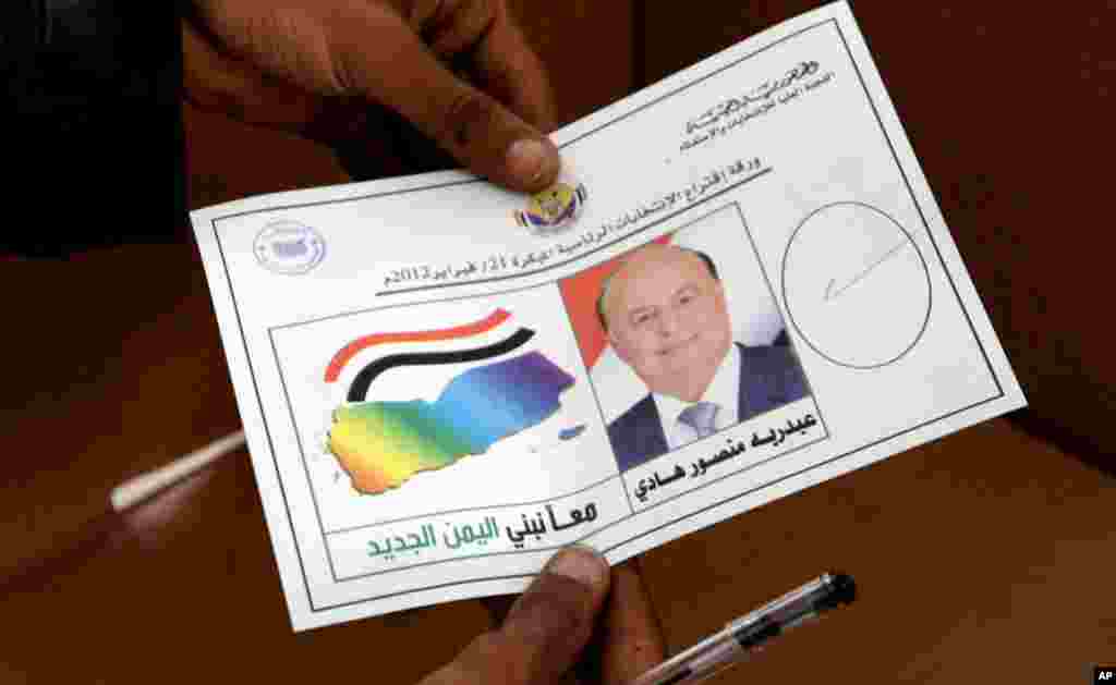 Yemeni voters can check their approval for the sole candidate in the presidential election. (VOA - E. Arrott)