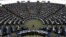FILE - Members of the European Parliament take part in a voting session at the European Parliament in Strasbourg, France, April 5, 2017. 
