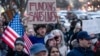 People near the White House protest against a funding freeze of federal grants and loans following a push from U.S. President Donald Trump to pause federal funding, in Washington on Jan. 28, 2025.