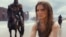 This image released by 20th Century Studios shows Freya Allan in a scene from "Kingdom of the Planet of the Apes."