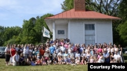 Member of Virginia's Pawmunkey Tribe gather for a group photograph while celebrating their formal recognition by the federal government, May 28, 2016. Photo, courtesy Pamunkey Chief Robert Gray