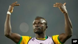 FILE - Senegal's Sadio Mane gestures prior to the start of the African Cup of Nations 2022 final against Egypt at the Ahmadou Ahidjo stadium in Yaounde, Cameroon, on February 6, 2022. 