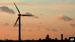 FILE - A wind turbine stands, generating power in Massachusetts, Feb. 24, 2006. (AP Photo/Stephan Savoia, File)