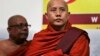FILE - Myanmar’s radical Buddhist monk Ashin Wirathu attends a media briefing in Colombo, Sri Lanka, Sept. 30, 2014. 
