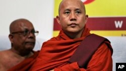 FILE - Myanmar’s radical Buddhist monk Ashin Wirathu attends a media briefing in Colombo, Sri Lanka, Sept. 30, 2014. 