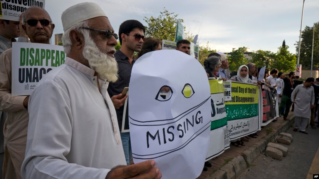 Pakistanis attend a rally to demand information about missing people who were reportedly picked up by security agencies during anti-al-Qaida raids, in Islamabad, Pakistan, Aug. 30, 2017. Scores of family members of the missing families joined civil society members and human rights activists on the occasion of the "International Day of the Victims of Enforced Disappearances."