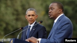 U.S. President Barack Obama (L) and Kenya's President Uhuru Kenyatta hold a joint news conference after their meeting at the State House in Nairobi, July 25, 2015.