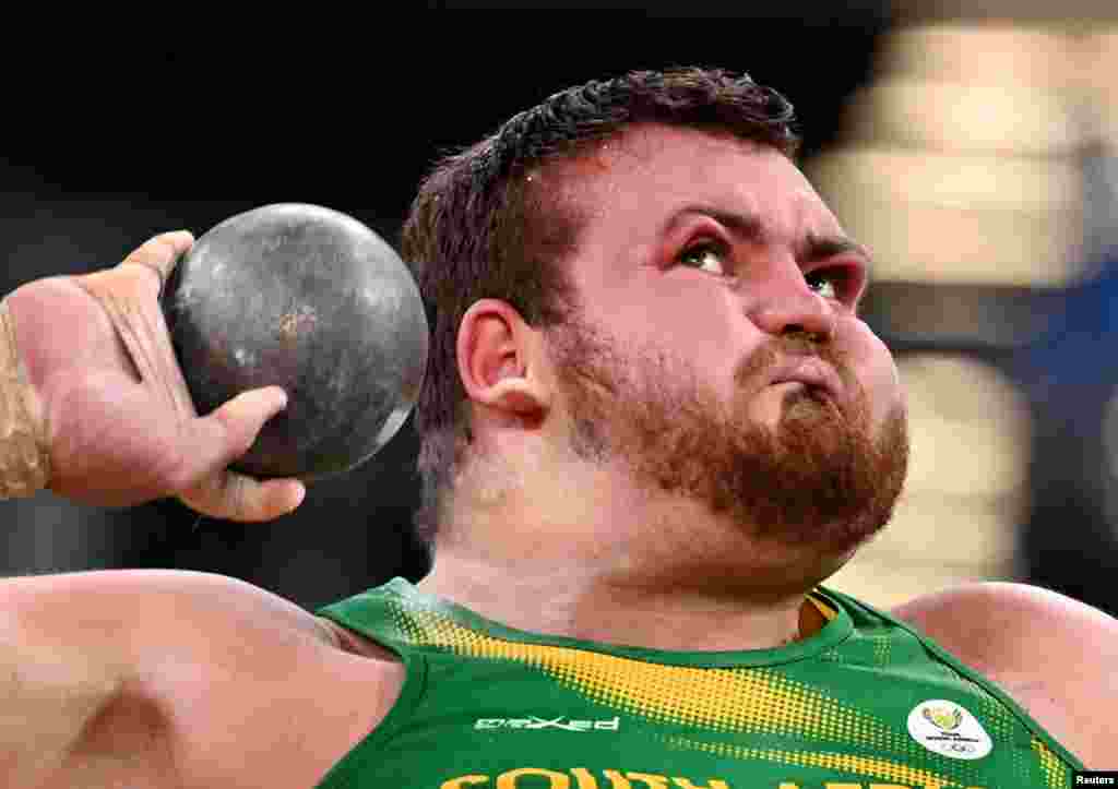 Kyle Blignaut of South Africa competes in qualifications for the men's shot put at the 2020 Summer Olympics in Tokyo, Japan.