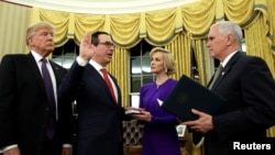 U.S. President Donald Trump, left, watches as Vice President Mike Pence, right, swears in Steve Mnuchin as Treasury Secretary next to his fiancé, Louise Linton, in the Oval Office of the White House in Washington, Feb. 13, 2017. 