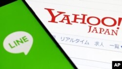 Wabah Covid-19 membuat rencana merger Yahoo Japan dan Line Corp. yang semula direncanakan dimulai Oktober 2020, menjadi tertunda. (Shinji Kita/Kyodo News via AP, File). 