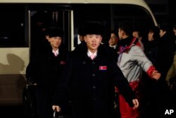 FILE - North Korean athletes and delegates arrive at the Olympic Village prior to the 2018 Winter Olympics in Gangneung, South Korea, Feb. 1, 2018.