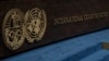 FILE - The logo of the International Court of Justice, left, and that of the United Nations are seen at the court in The Hague, Netherlands, Oct. 12, 2023.