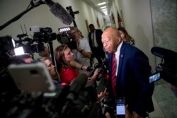 FILE - House Committee on Oversight and Reform Chairman Rep. Elijah Cummings, D-Md., speaks to members of the media before Acting Secretary of Homeland Security Kevin McAleenan appears before a hearing on Capitol Hill in Washington, July 18, 2019.