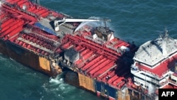 A damaged section of the hull of the MV Stena Immaculate is pictured, as the tanker lays at at anchor in the North Sea, off the coast of Withernsea, east of England, on March 11, 2025.