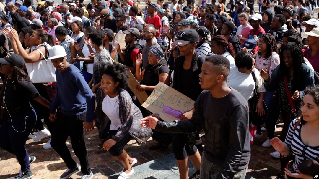 Students chant at the University of Cape Town as they protest for free education in Cape Town, South Africa, Sept. 20, 2016.