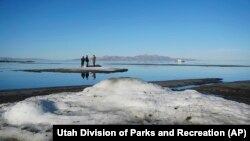 In this undated photo provided by the Utah Division of Parks and Recreation, are rare salt formations that are being are being documented for the first time along the shores of the Great Salt Lake in Utah.