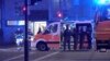 Los trabajadores de emergencia y la policía se reúnen en la escena luego de un tiroteo mortal en Hamburgo, Alemania, el 9 de marzo de 2023 (hora local) en esta imagen fija tomada de un video. [Foto suministrada a Reuters por un tercero]